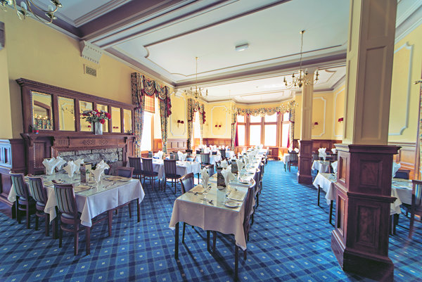 Dining area for customers to eat breakfast and dinner at the Highland Hotel dining room