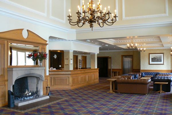 Reception area with Lounge and open fire at the Loch Tummel Hotel