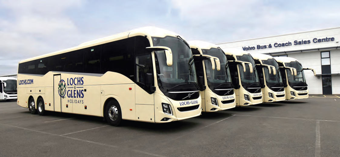  Premium Lochs and glens coaches parked outside the volvo garage