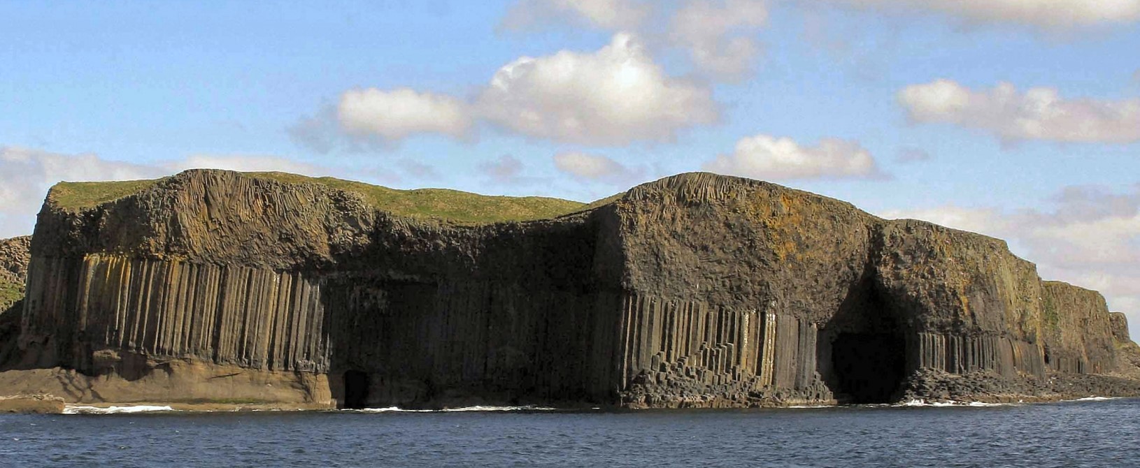  Views of the island of Staffa from aboard a local boat crossing from Fionnphort on the Isle of Mull